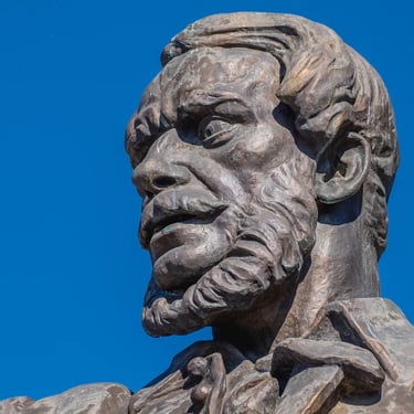 Head of Lajos Kossuth captured on his statue, symbol of devotion and independence.