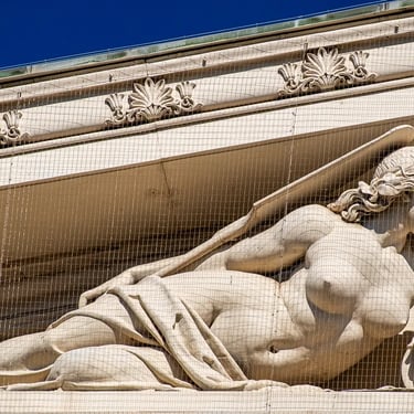 Statue of the lady personifying the Dráva River, symbol of Hungary, on the pediment.