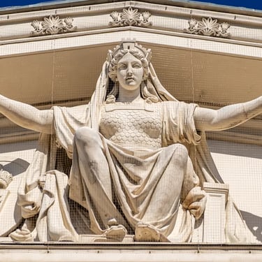 Central statue of Pannonia holding laurel wreaths, uniting homeland and aspirations.