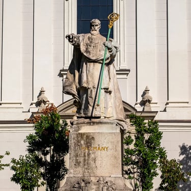 Full frontal view of the Péter Pázmány statue outside Saint Joseph Church, Budapest.