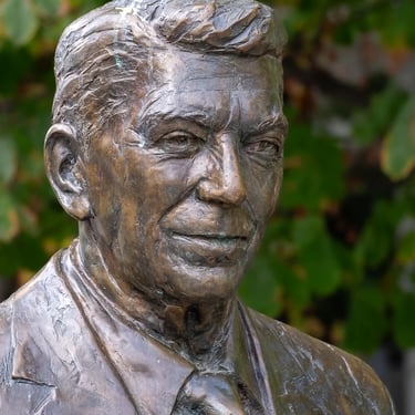 Front view of the Ronald Reagan statue’s head, showing a determined expression.