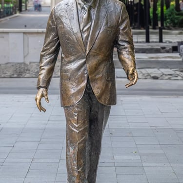 Full frontal view of the Ronald Reagan statue, standing tall in Budapest.