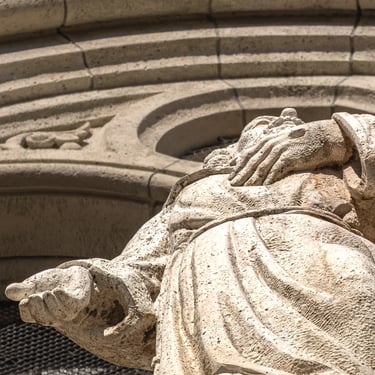 Upward view showing both of St. Francis’s hands, emphasizing stigmata and movement.