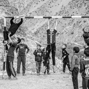 A powerful black and white image showing that the love for football transcends bysaid mrigua photographer