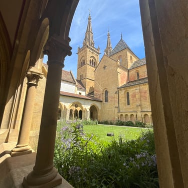 Collegiate Church of Notre Dame in Neuchâtel from within its lovely courtyard