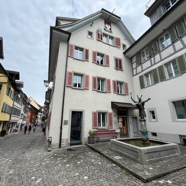 Buildings and statue in the Zug Old Town