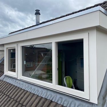 a window with a view of a roof top