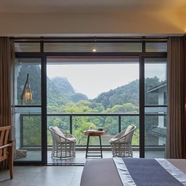 Yangshuo's Li River and mountains right from your Riverview Double room