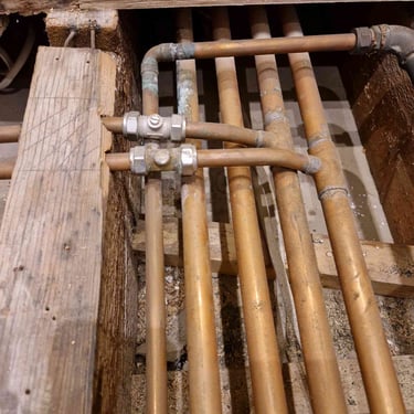 Pipework alteration needed to reduce the high of the pipework that was in contact with the floorboards