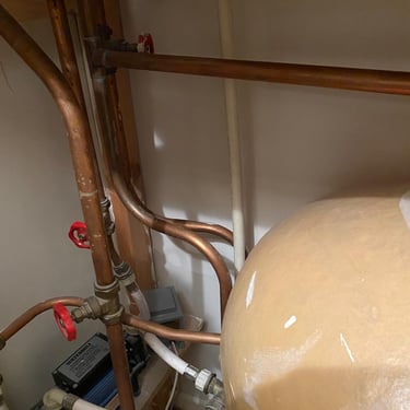 Airing cupboard requiring pipework clean up and shower pump reposition