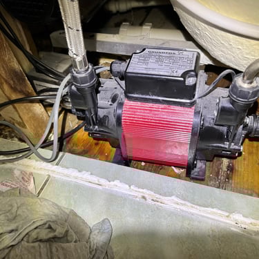 Old shower pump that needs replacing