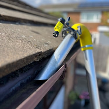 Gutter cleaning vac using a ferret inspection camera