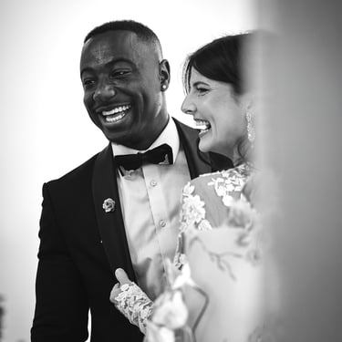 Married couple smiling at wedding