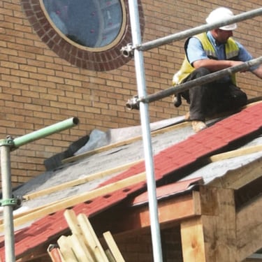 Preparing felt and battens for the porch roof