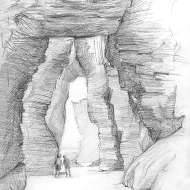 huge rock arches on beach spain