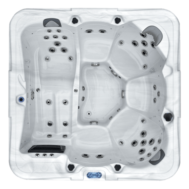 a hot tub with a white hot tub and a blue sky background