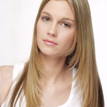Beautiful model with straight fringy hair framing her face. Portrait Hair Makeup and Photography by Bruce Kushnick for wonder
