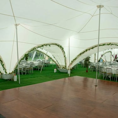 High quality marquee hire with dance floor and bar area