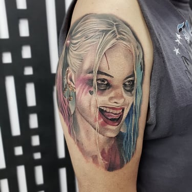 Color realism portrait tattoo of Harley Quinn by Tone Rez at Orange Grove Tattoo in Oviedo, Florida outside of Orlando. 
