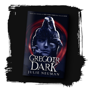 The book "Gregoir Dark" by Julie Neuman. A crow with a young man's face on its stomach, and crows emerging from his face.