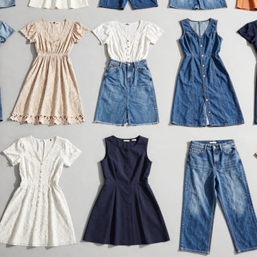 Clean flat-lay of brand-name women's dresses and denim on a light grey background, bright daylight, high contrast
