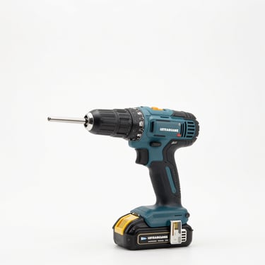 Bright high-key product photography of a professional cordless drill kit with spare batteries, white background, crisp studio light