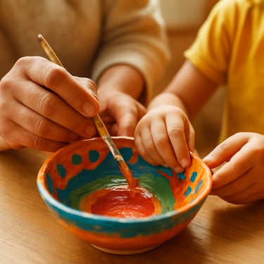 Hands of an educator and a young participant working together on a colorful ceramic craft, warm natural window light, macro shot focusing on the collaborative action, 35mm lens