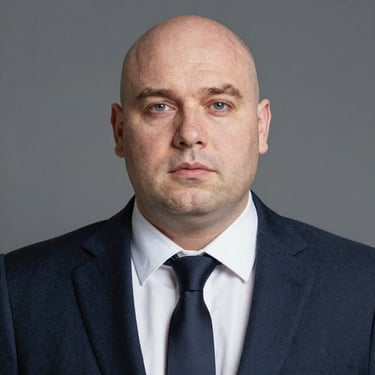 Luxurious pool area with Jacuzzi and deck overlooking the sea.