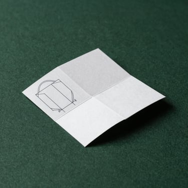 Minimalist white line technical drawing of a luxury box fold template on a deep forest green background, architectural drafting style, high contrast