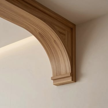 Close-up of a perfectly scribed timber architrave meeting a bespoke wall panel, flawless wood joint, elegant profile.