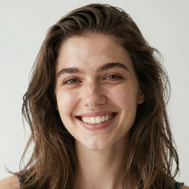 A smiling woman in a lab coat reviewing product samples in a bright, modern lab.