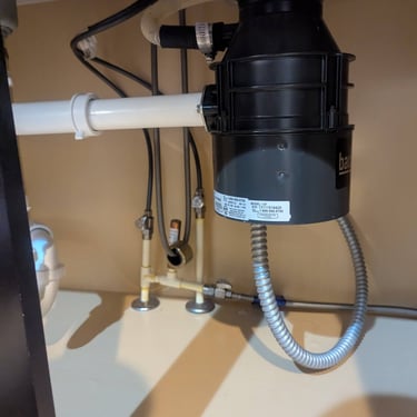Garbage disposal installation under kitchen sink Dayton OH