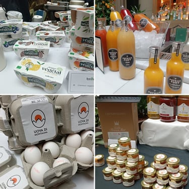 Selezione di prodotti premium per la colazione tra latticini, succhi, uova e confetture