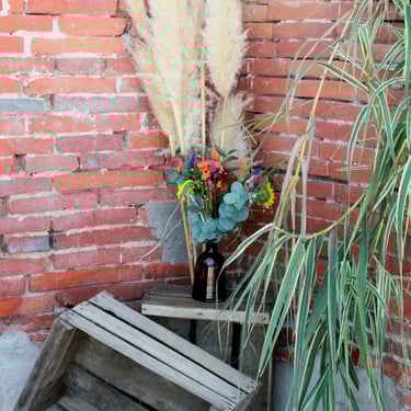 Décoration de mariage de fleurs séchées, multicolores, réalisée par l'Ensorce'Fleurs