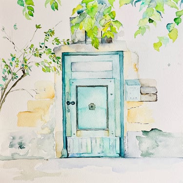 Turquoise wooden entrance door set in pale stone façade by Weronika Kacperski