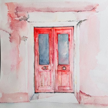 Red double wooden door on soft pink plaster wall