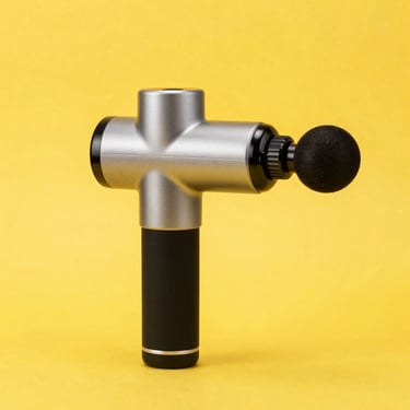 Isolated shot of a sleek modern massage gun on a vibrant yellow backdrop, high-key studio lighting, sharp focus