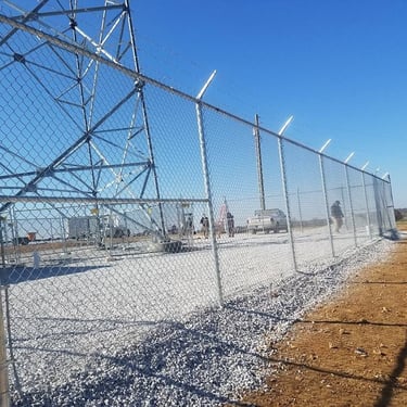 Commercial chain link fence with barbed wire installed for business security in Kentucky