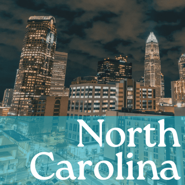 Charlotte skyline at night with the words "North Carolina" written in white 