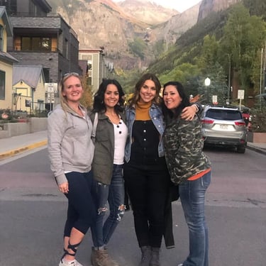 a group of friends posing for a picture