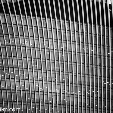 A close-up detailed black & white photo of a modern skyscraper building