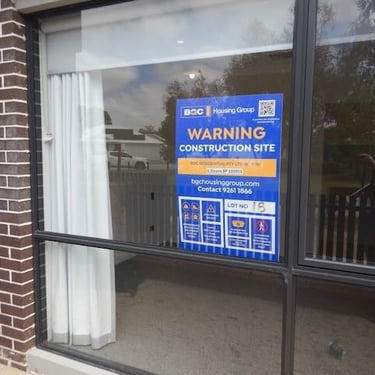 Registered builder conducting practical completion inspection in Perth, checking interior finishes and cabinetry alignment.