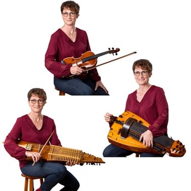 Claudia spielt und unterrichtet Nyckelharpa, Drehleier und Fiddle
