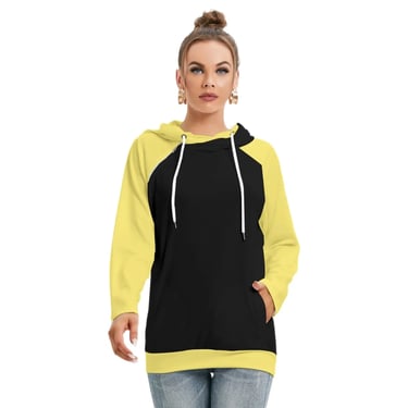 a woman wearing a black and yellow hoodie