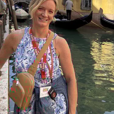 Blue denim button down shirt shown off the body to display its lightweight fabric