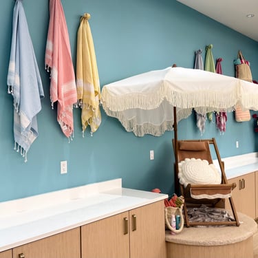 French Riviera inspired decor inside Villages St. Tropez recreation center with coastal design details