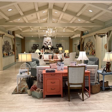 Beach inspired decor and seating area inside a Villages Sea Breeze recreation center with coastal design details