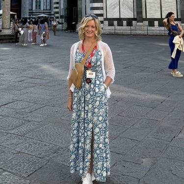 Me wearing a white shrug for light coverage during warm weather in Italy