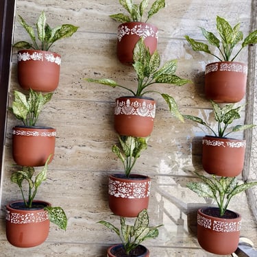 use of waste plastic , garden of kavita