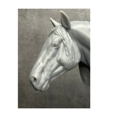 Close-up of 3D printed horse head showing anatomical fidelity and surface smoothness.